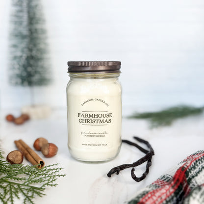 mason jar candle labeled 'Farmhouse Christmas' with pine, vanilla, spice, soy candle, farmhouse candle